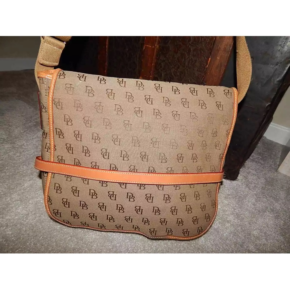 Dooney and Bourke 90’s Monogram messenger bag. Used.